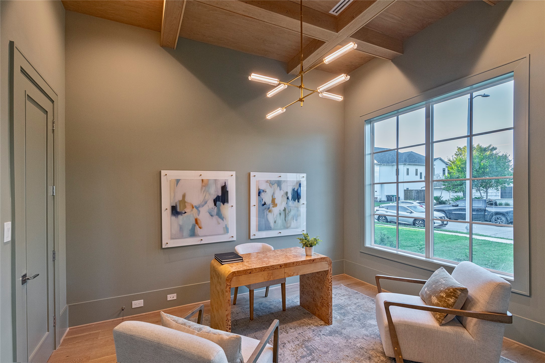 1407 Martin Street Houston, TX 77018 - Photo 5 of 33 Study is masterfully crafted with custom white oak ceiling, doors and visual comfort lighting.