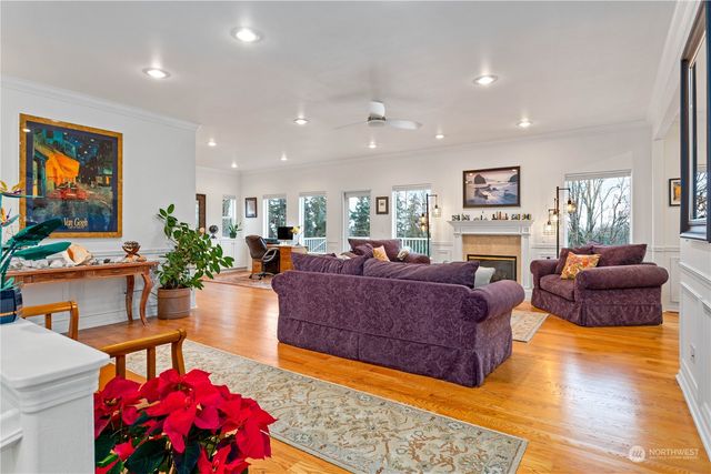a living room with furniture a couch and a dining table