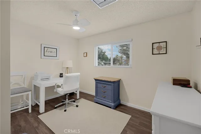 a workspace with furniture and window