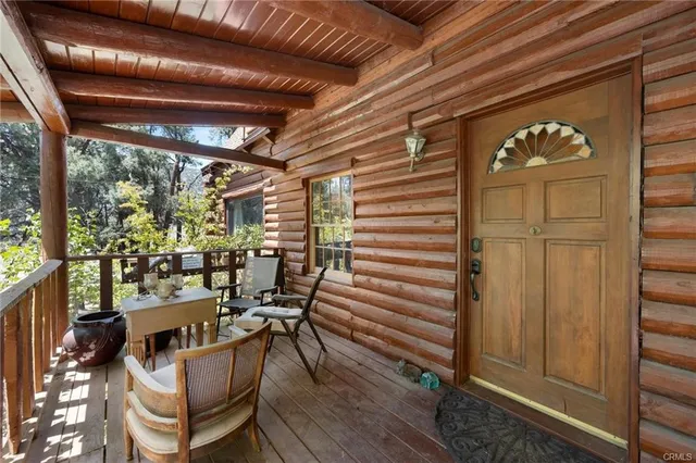 a view of a chairs and table in a patio