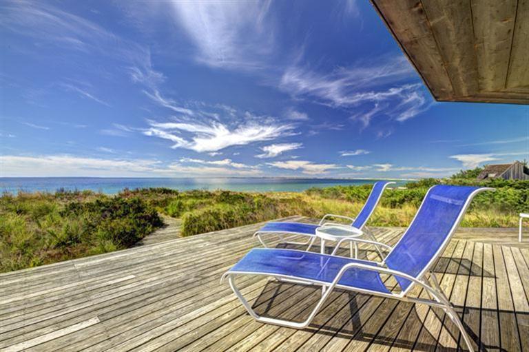 51 Fishermans Road Truro, MA 02666 - Photo 8 of 34 a view of a balcony with chairs