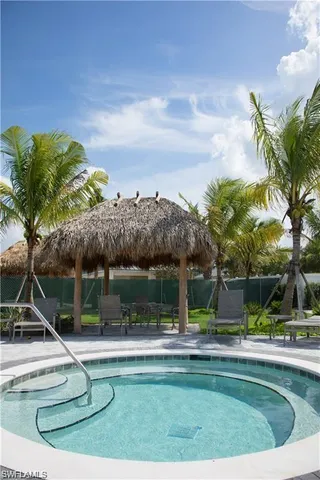 a view of a swimming pool with a patio