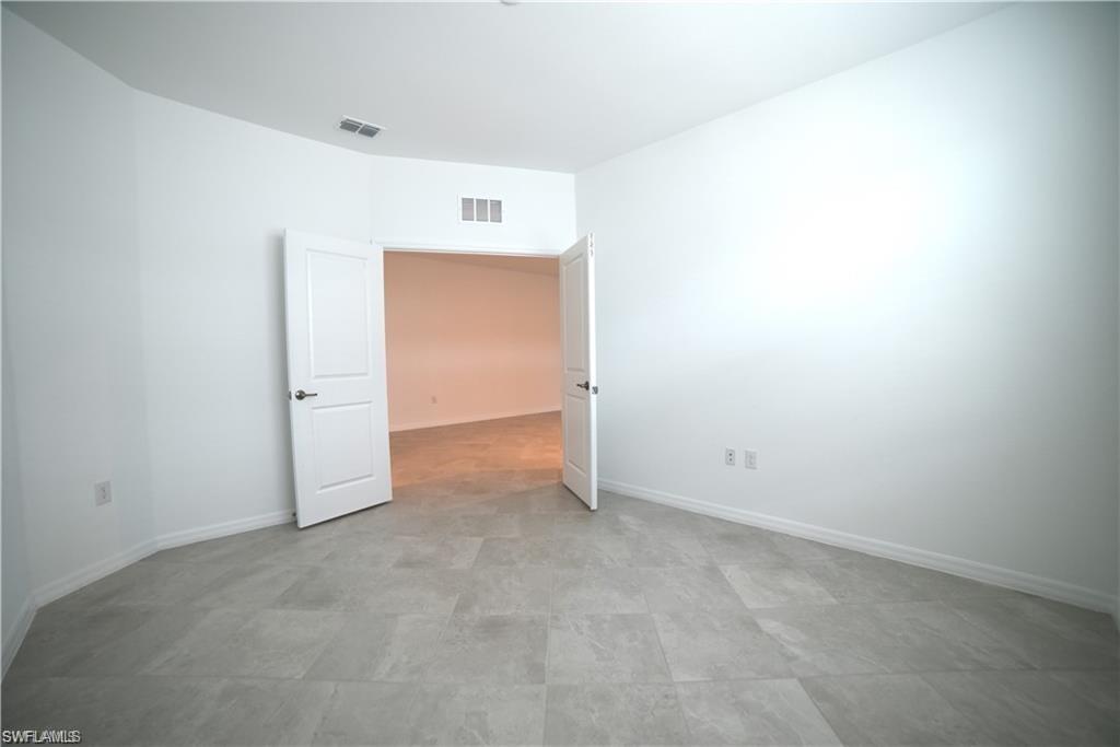 2665 Vine Avenue Naples, FL 34120 - Photo 8 of 30 a view of an empty room