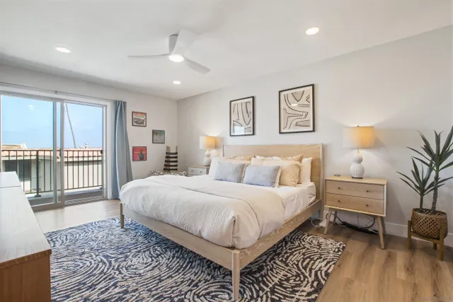 a bed room with a bed and a couch