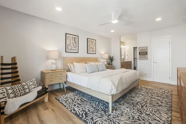 a bed room with a bed and a couch