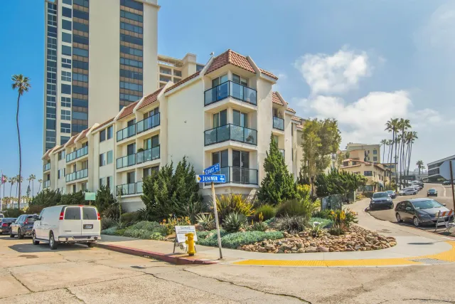a front view of a building with street view