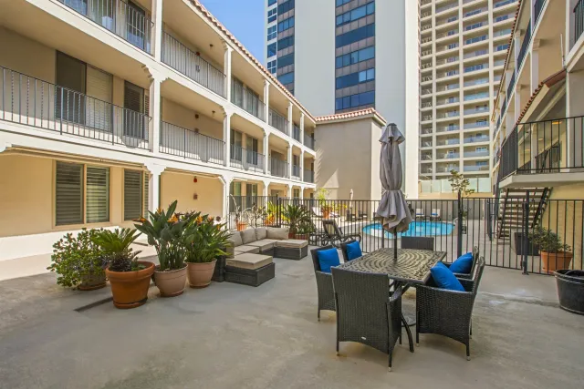 a view of a building with outdoor seating