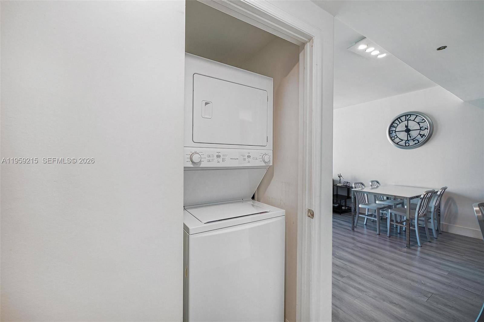 500 Brickell Avenue, Unit 1903 Miami, FL 33131 - Photo 12 of 18 a view of a livingroom with furniture and wooden floor