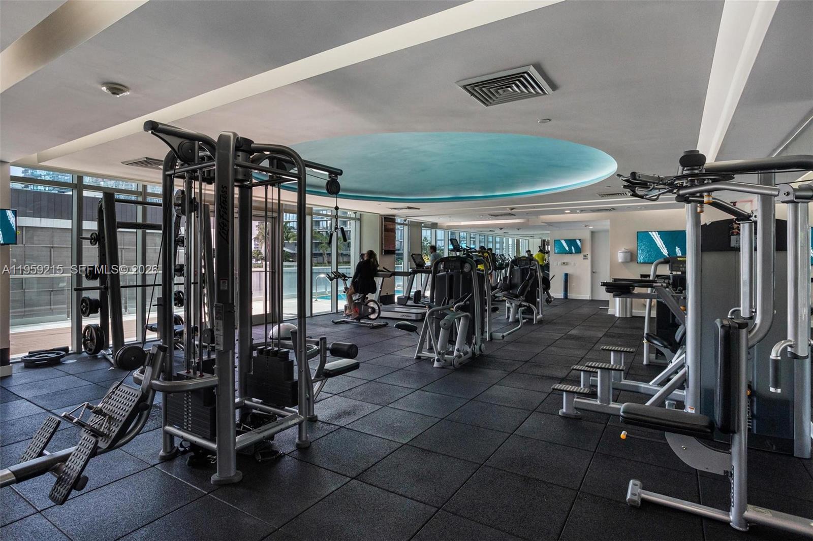500 Brickell Avenue, Unit 1903 Miami, FL 33131 - Photo 16 of 18 a view of a room with gym equipment