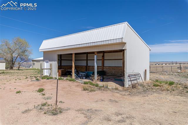 11170 Peaceful Valley Road Colorado Springs, CO 80925 - Photo 48 of 49 View of pole building