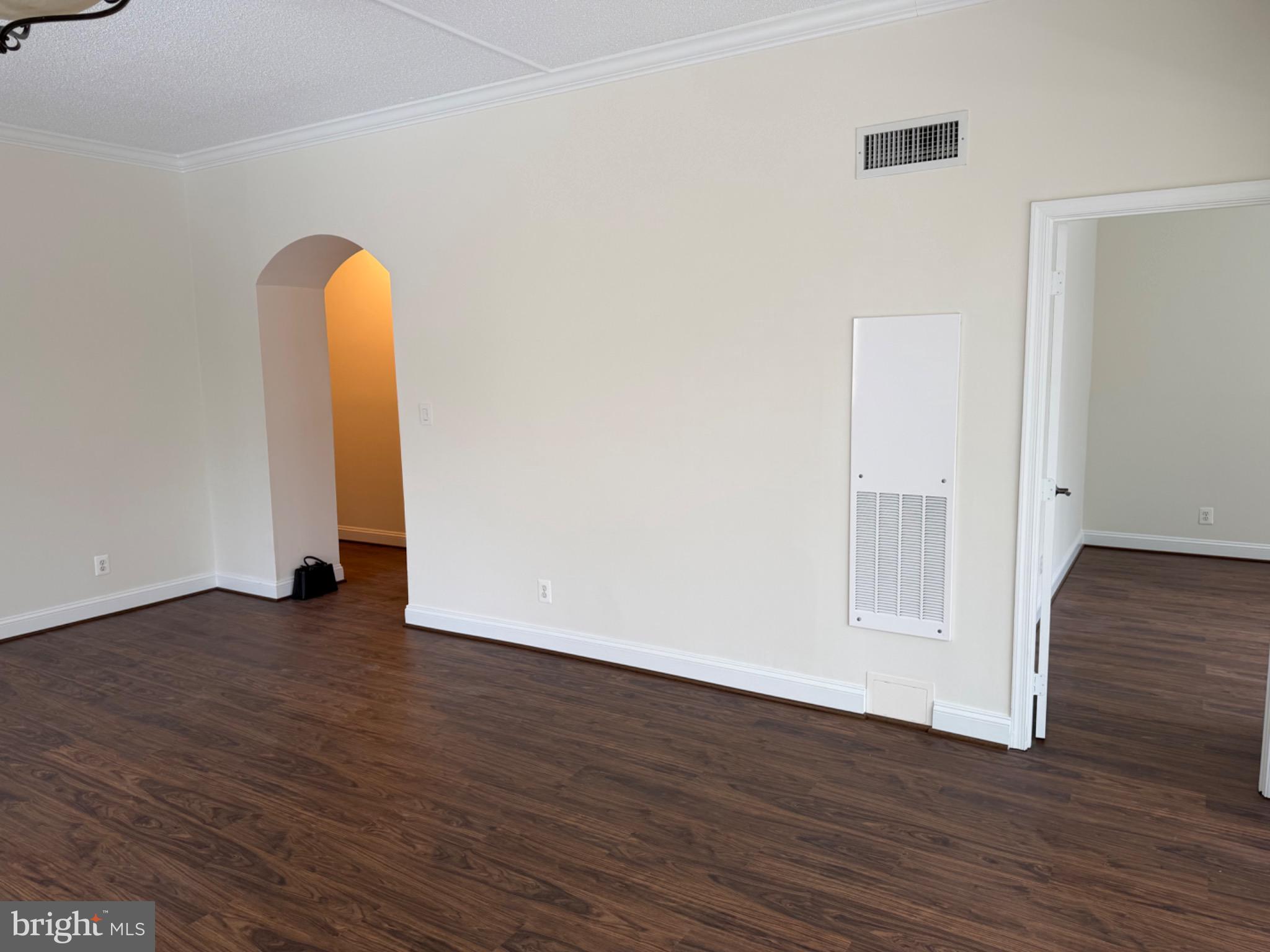 5225 Pooks Hill Road, Unit C29N Bethesda, MD 20814 - Photo 10 of 54 a view of a room with wooden floor and entryway