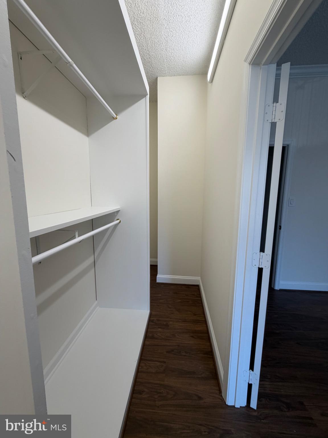 5225 Pooks Hill Road, Unit C29N Bethesda, MD 20814 - Photo 19 of 54 a view of a hallway with wooden floor and staircase