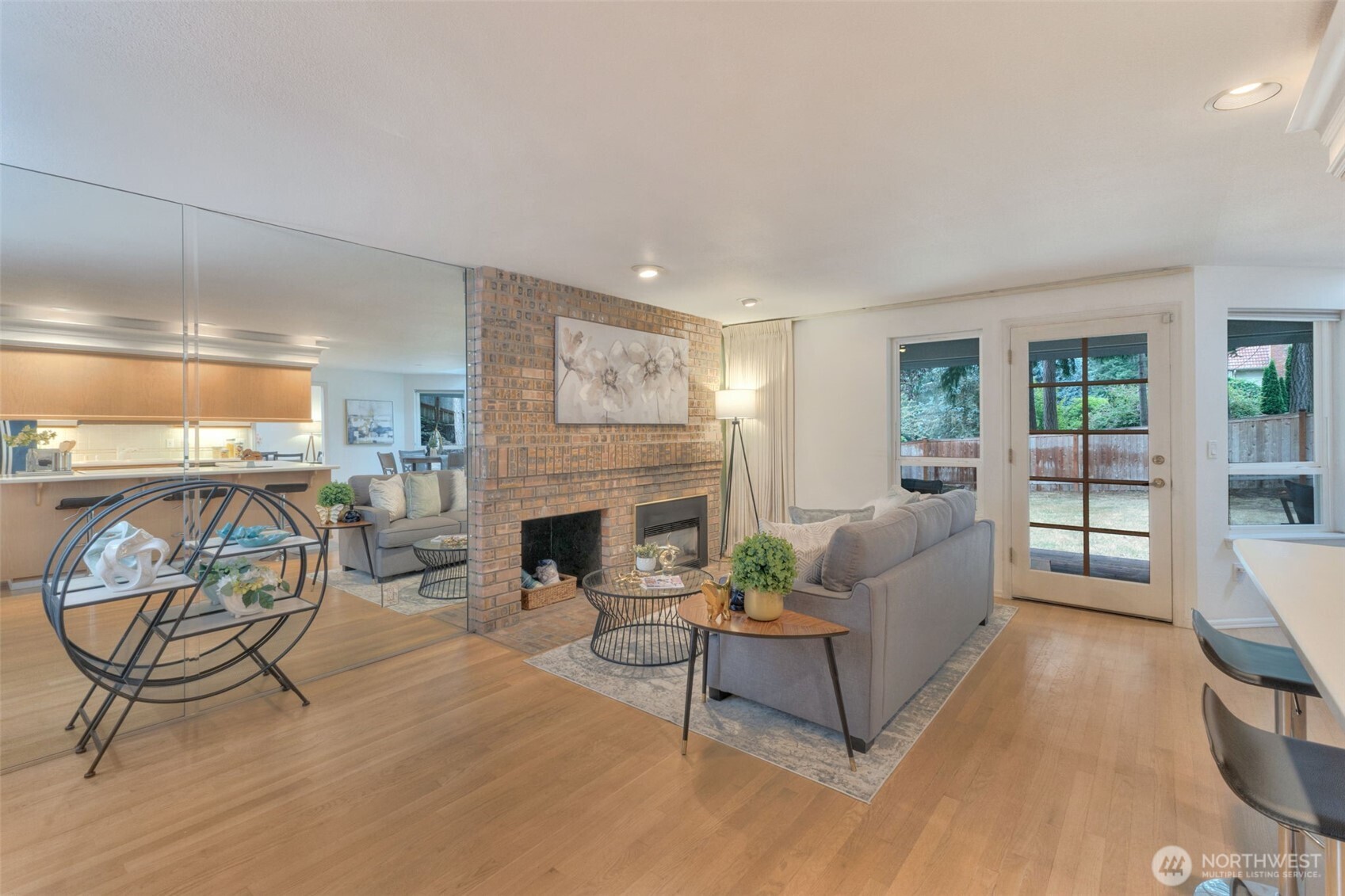 311 Keach Loop Steilacoom, WA 98388 - Photo 17 of 38 a living room with furniture and a fireplace
