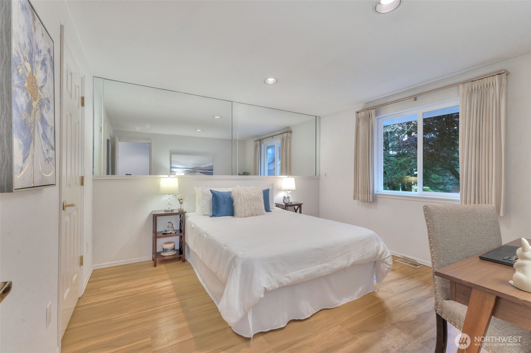 311 Keach Loop Steilacoom, WA 98388 - Photo 19 of 38 a bedroom with a large bed and a window