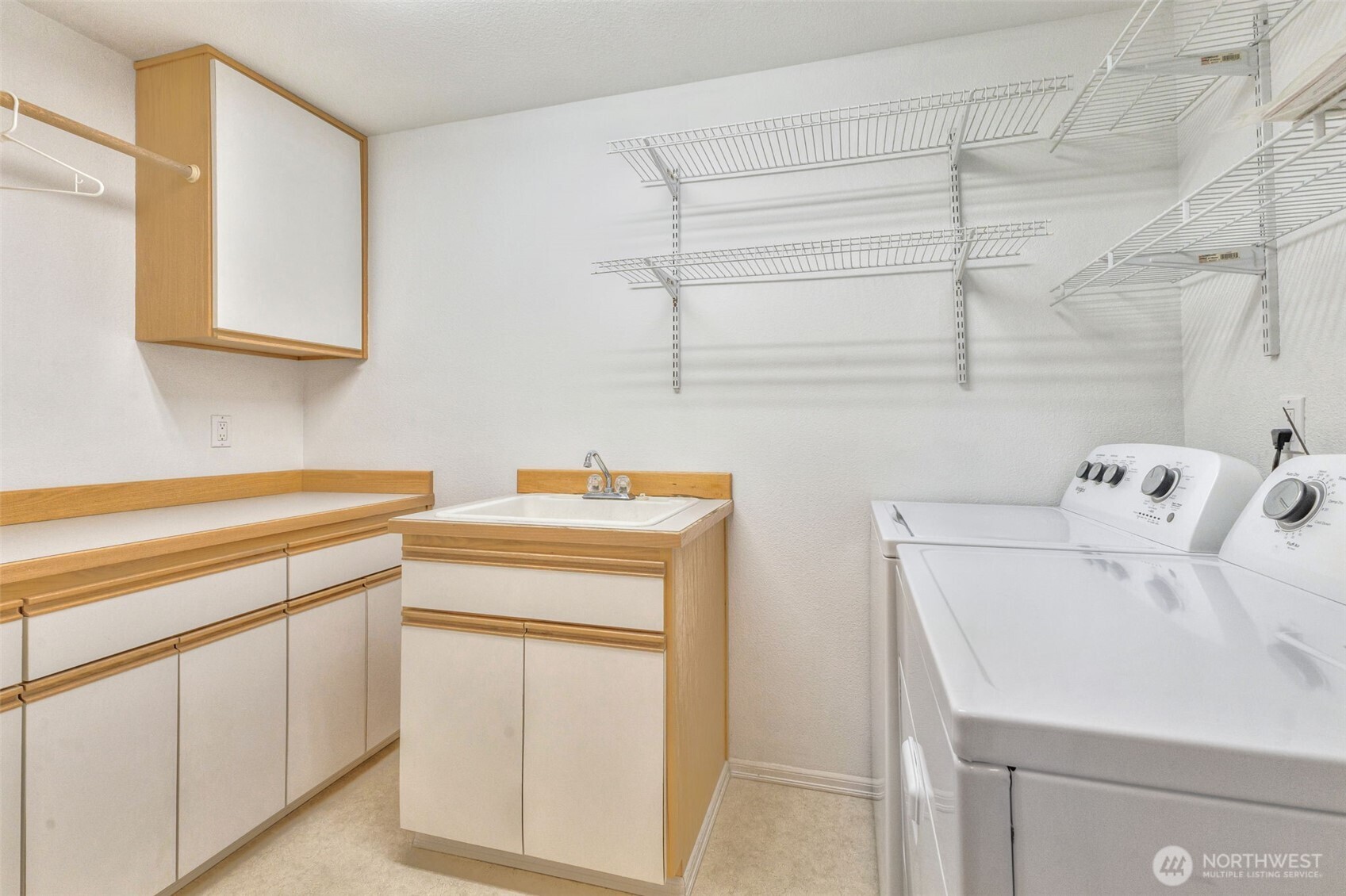 311 Keach Loop Steilacoom, WA 98388 - Photo 22 of 38 a utility room with dryer and washer
