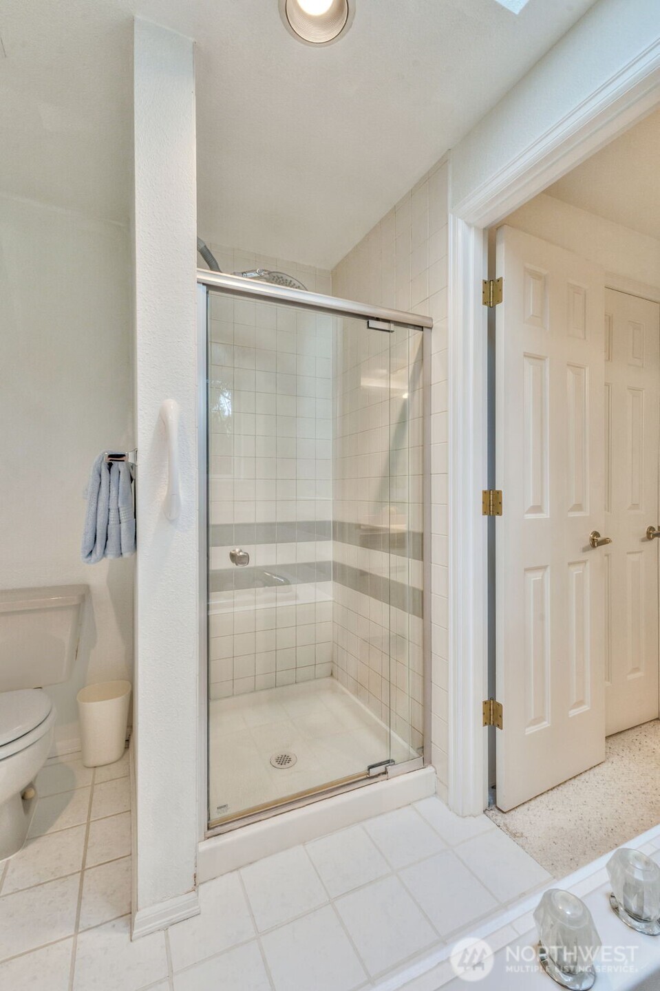 311 Keach Loop Steilacoom, WA 98388 - Photo 32 of 38 a bathroom with a shower