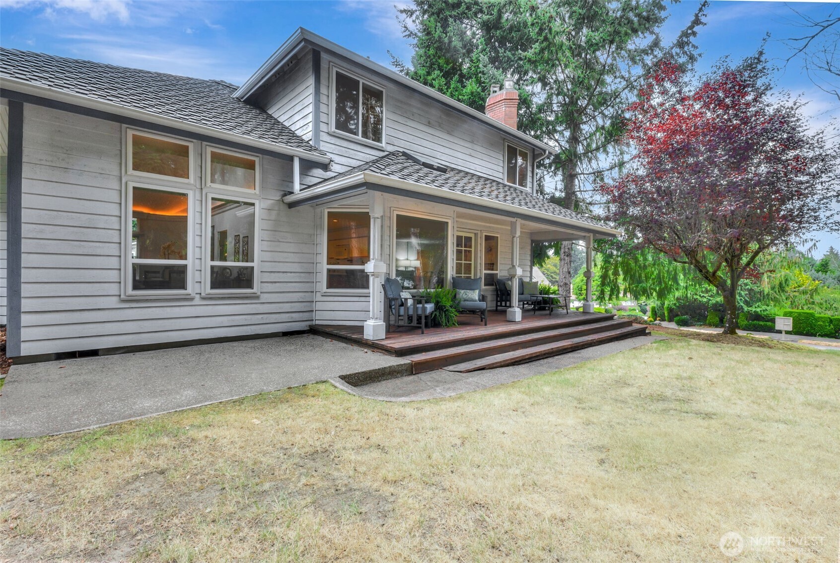 311 Keach Loop Steilacoom, WA 98388 - Photo 34 of 38 a front view of house with yard and green space