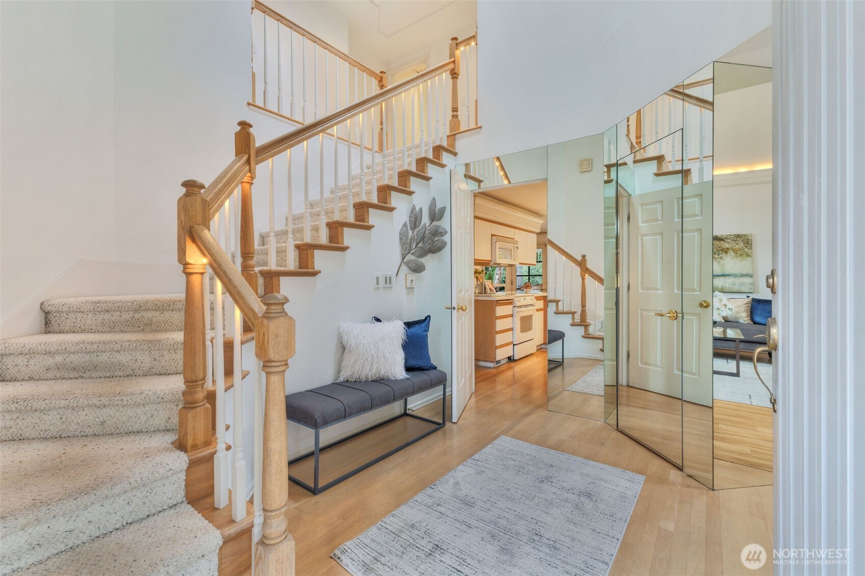 311 Keach Loop Steilacoom, WA 98388 - Photo 6 of 38 a view of entryway and hall with wooden floor