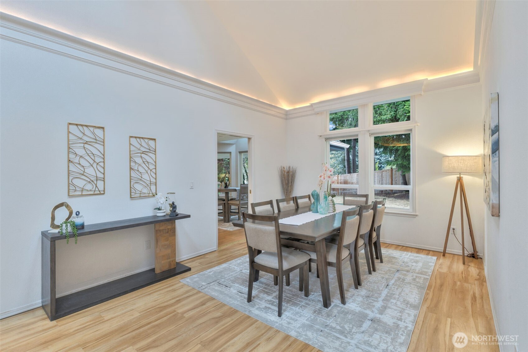 311 Keach Loop Steilacoom, WA 98388 - Photo 10 of 38 a view of a dining room with furniture and wooden floor