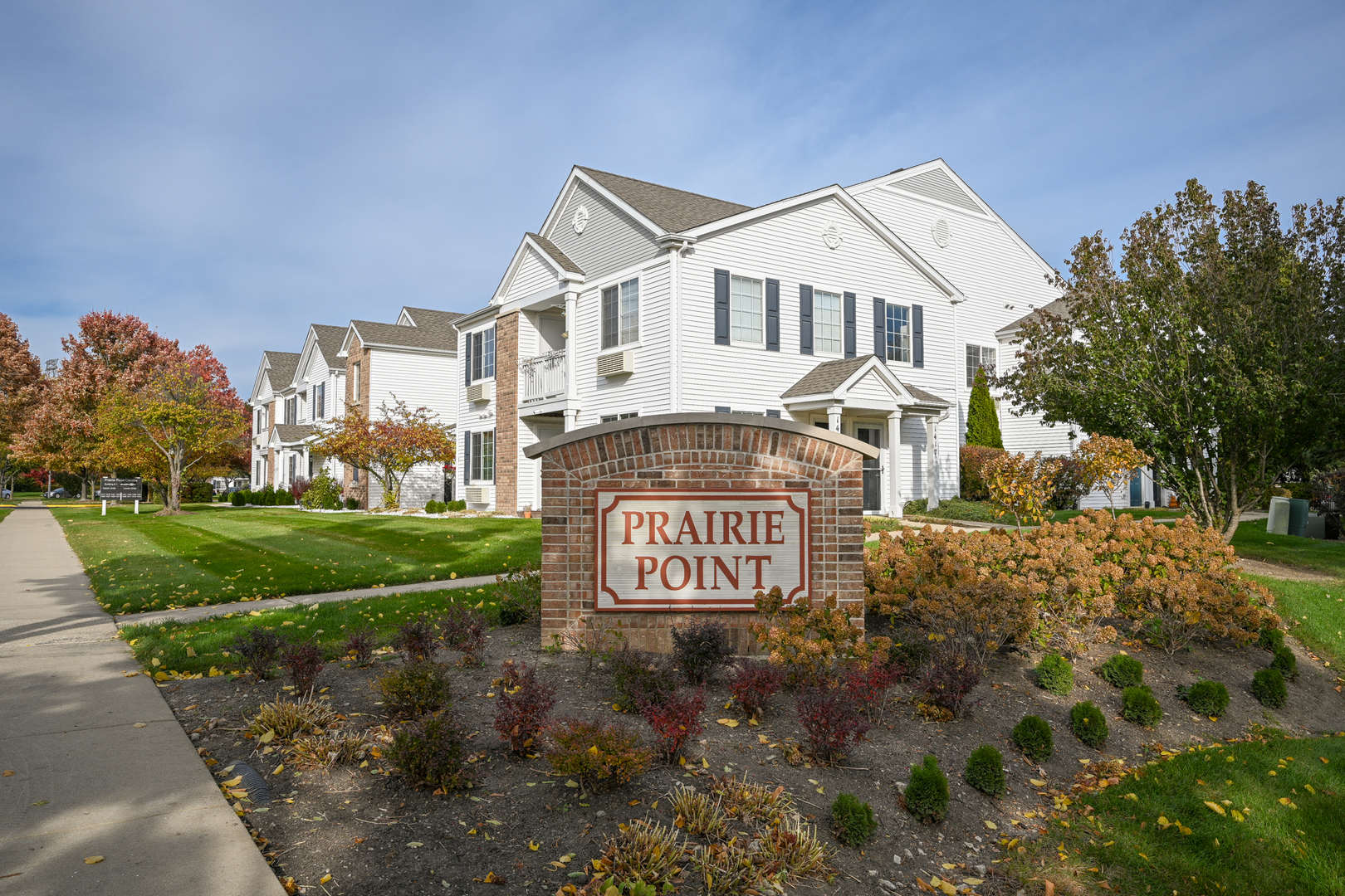 1425 McClure Road, Unit 1425 Aurora, IL 60505 - Photo 12 of 12 a view of a street with sign board