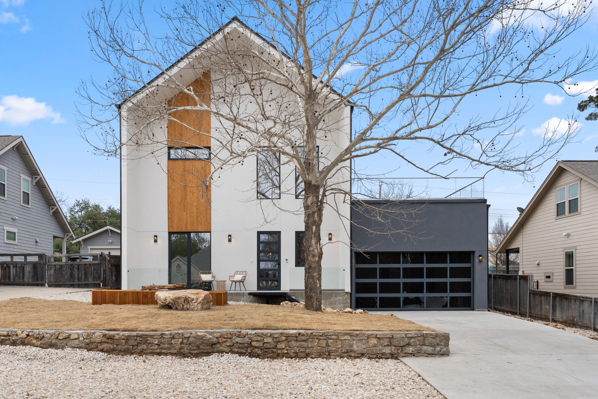 2915 Chisholm Trail Austin, TX 78734 - Photo 2 of 35 a front view of a house with a yard