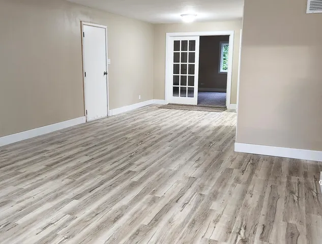 wooden floor and windows in a room
