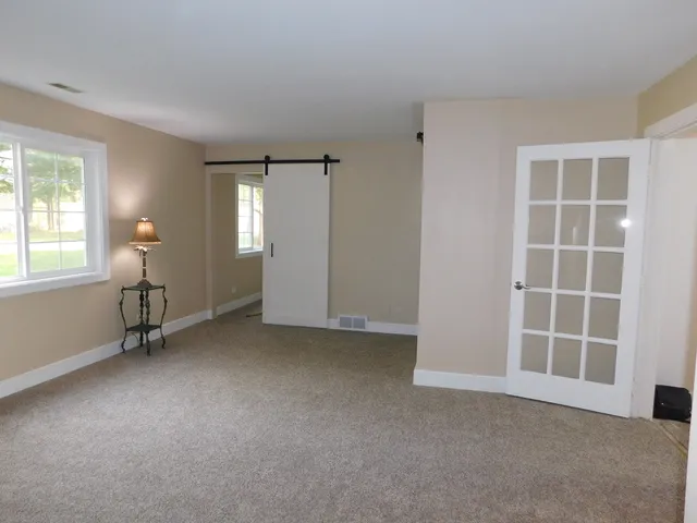 an empty room with windows