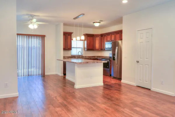 a view of kitchen with wooden floor