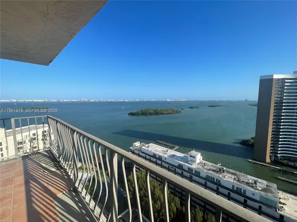 a balcony with an ocean view