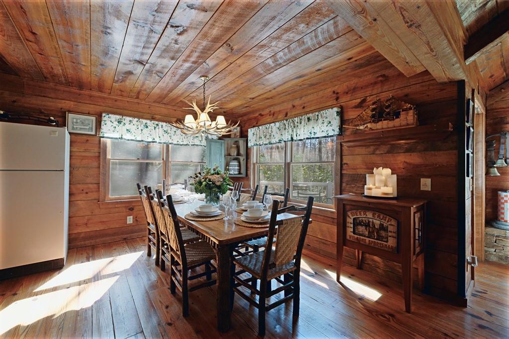 2320 Hardman Road Clarkesville, GA 30523 - Photo 29 of 53 a view of a dining room with furniture window and wooden floor