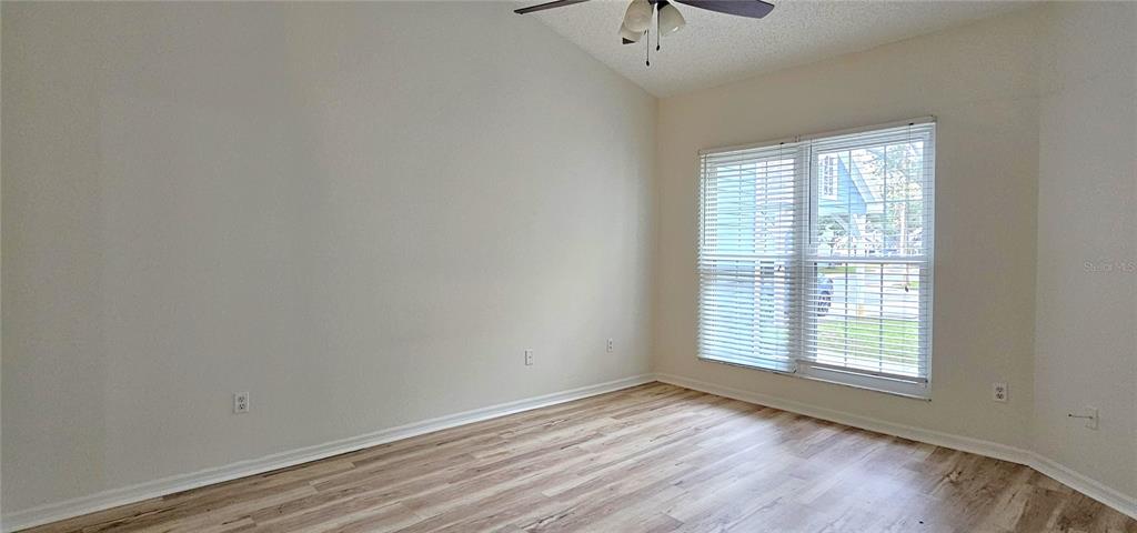 2736 Penzance Street Palm Harbor, FL 34684 - Photo 11 of 27 an empty room with a window