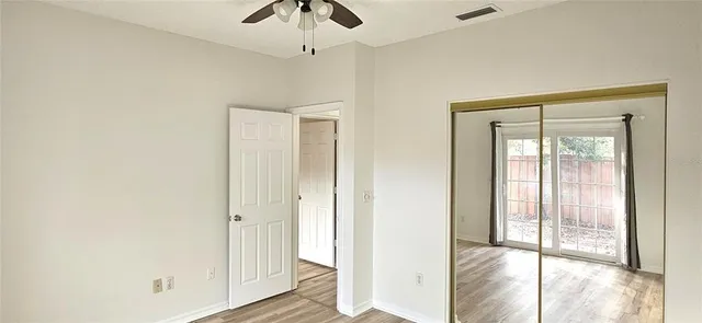 a view of an empty room and window