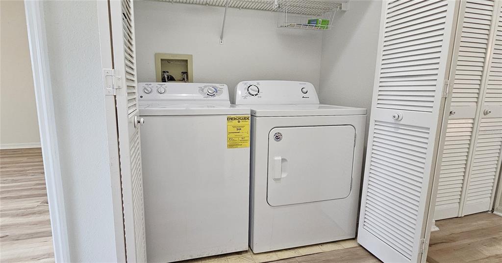 2736 Penzance Street Palm Harbor, FL 34684 - Photo 24 of 27 a utility room with dryer and washer