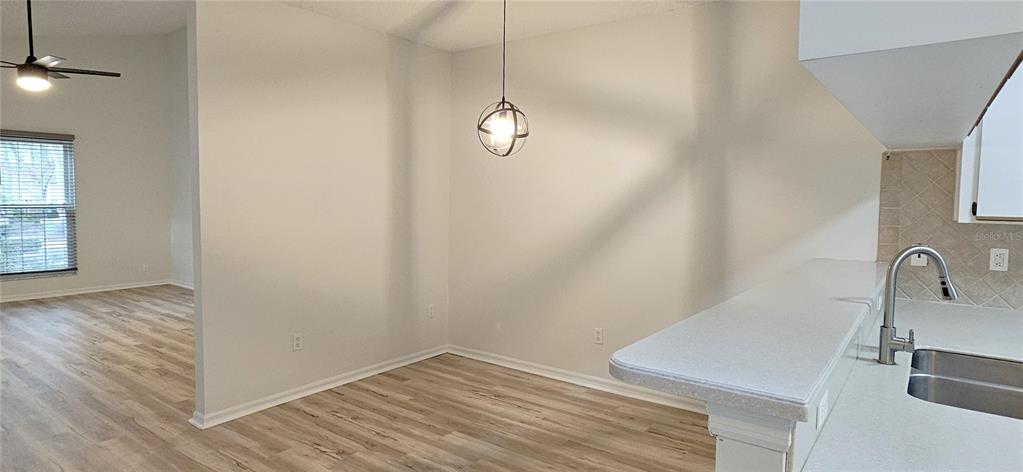 2736 Penzance Street Palm Harbor, FL 34684 - Photo 8 of 27 a bathroom with a sink and vanity