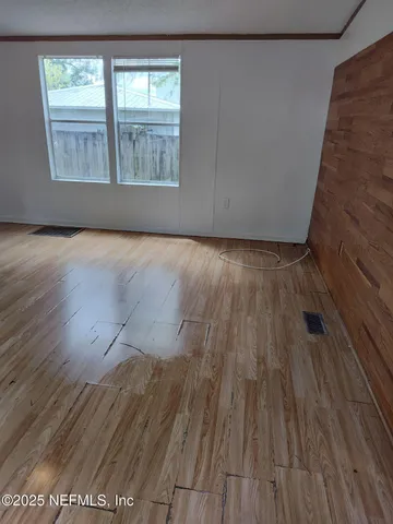 a white refrigerator freezer sitting in a kitchen