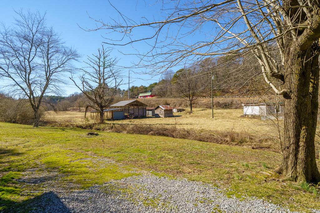7589 Tails Creek Road Ellijay, GA 30540 - Photo 1 of 44 a view of an ocean with a house