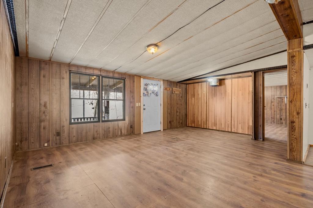 7589 Tails Creek Road Ellijay, GA 30540 - Photo 30 of 44 a view of an empty room with a window