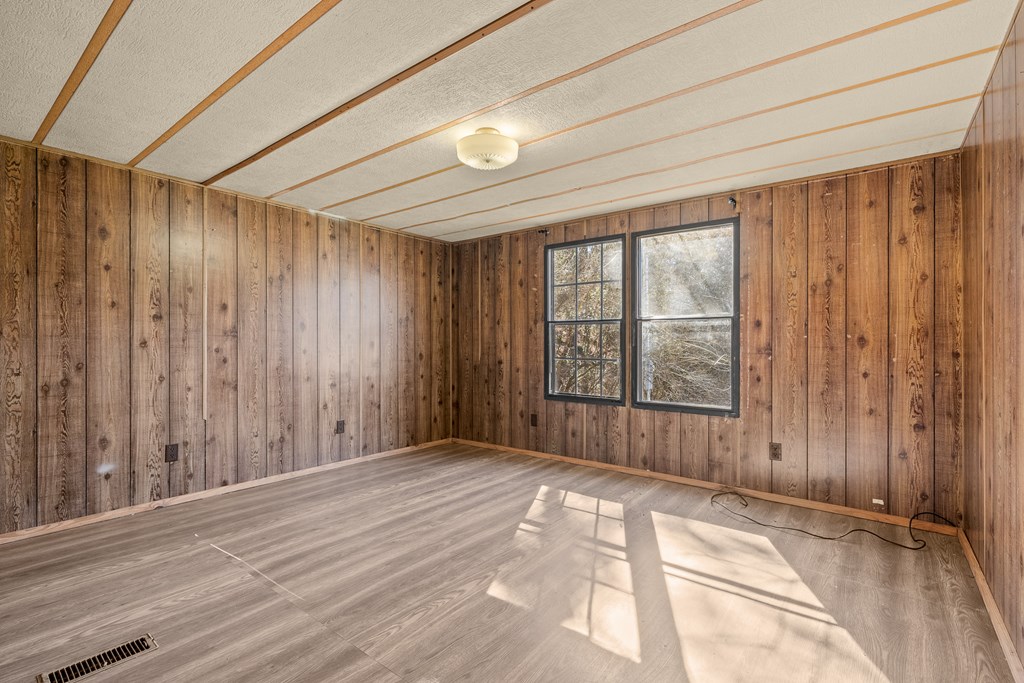 7589 Tails Creek Road Ellijay, GA 30540 - Photo 37 of 44 a view of an empty room with a window