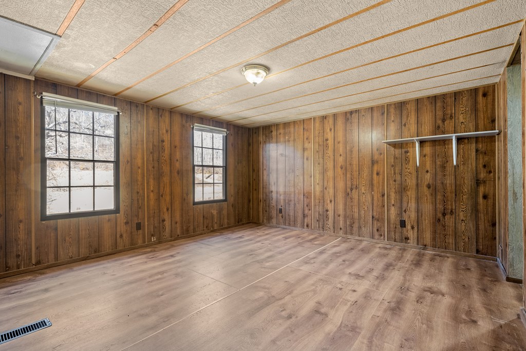 7589 Tails Creek Road Ellijay, GA 30540 - Photo 39 of 44 an empty room with windows