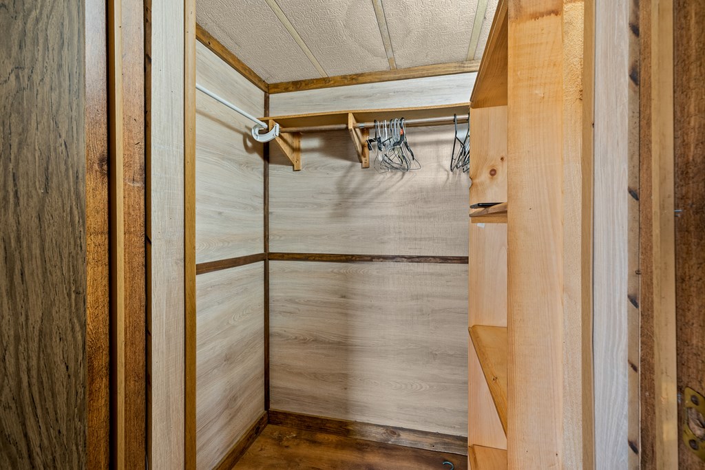 7589 Tails Creek Road Ellijay, GA 30540 - Photo 43 of 44 a bathroom with a glass door shower
