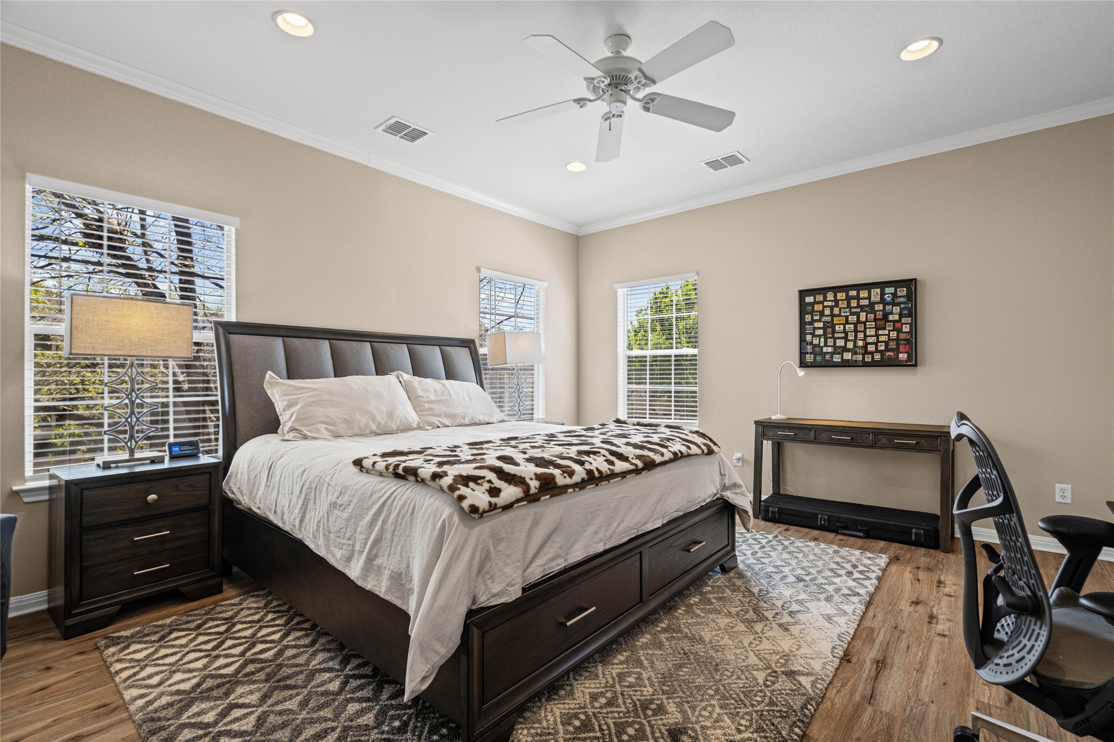 411 West St Elmo Road, Unit 24 Austin, TX 78745 - Photo 15 of 29 a bedroom with a bed and a window