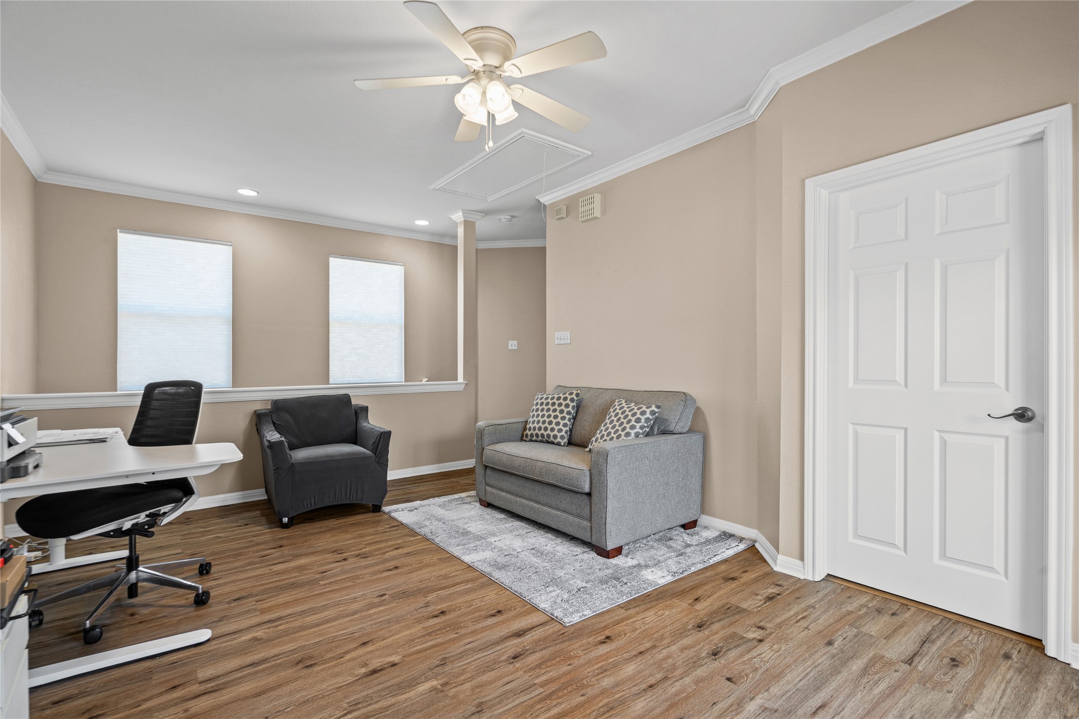 411 West St Elmo Road, Unit 24 Austin, TX 78745 - Photo 19 of 29 a living room with furniture and a wooden floor