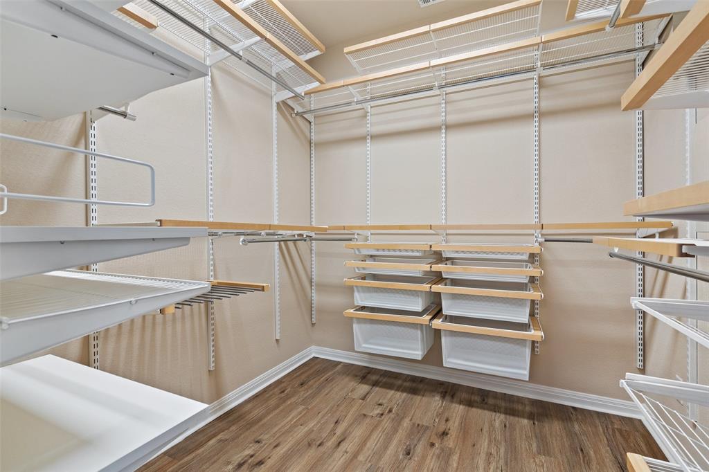 411 West St Elmo Road, Unit 24 Austin, TX 78745 - Photo 20 of 29 Walk in closet featuring light wood finished floors