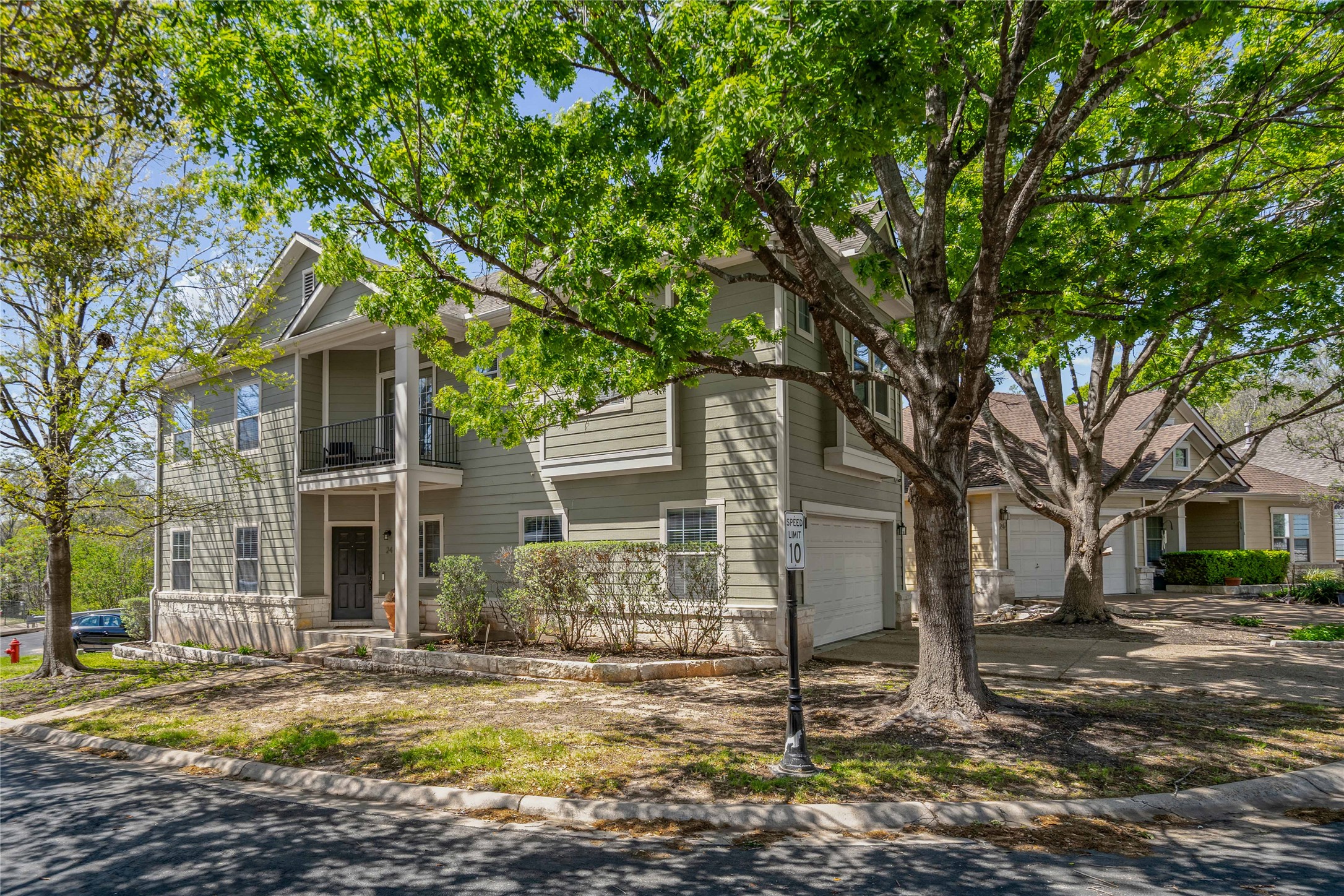 411 West St Elmo Road, Unit 24 Austin, TX 78745 - Photo 3 of 29 a view of a yard in front of a house