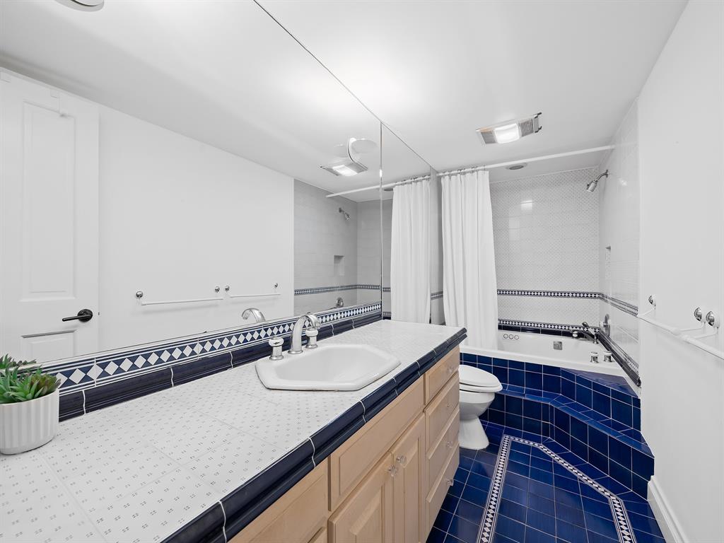 3400 Galt Ocean Drive, Unit 1202S Fort Lauderdale, FL 33308 - Photo 21 of 36 a bathroom with a sink and a mirror