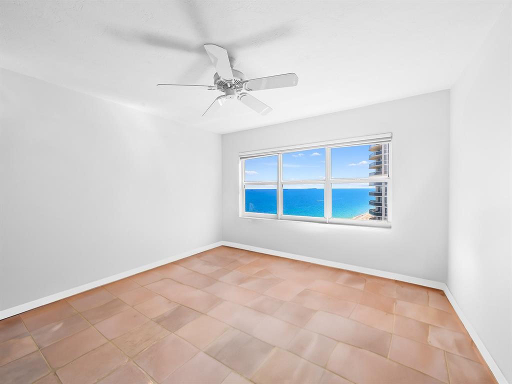 3400 Galt Ocean Drive, Unit 1202S Fort Lauderdale, FL 33308 - Photo 22 of 36 an empty room with windows