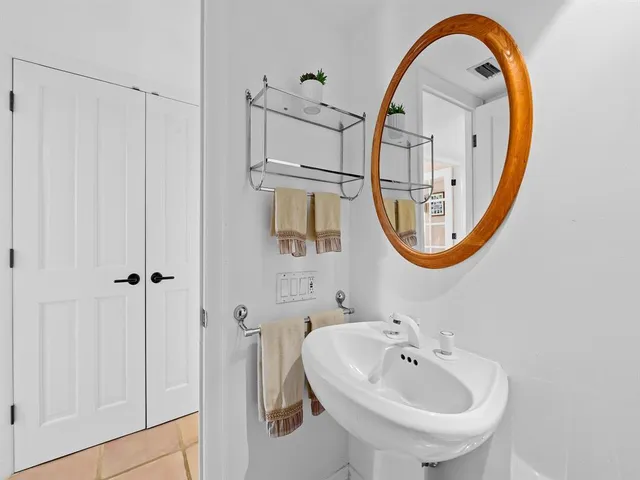 a bathroom with a toilet and a sink