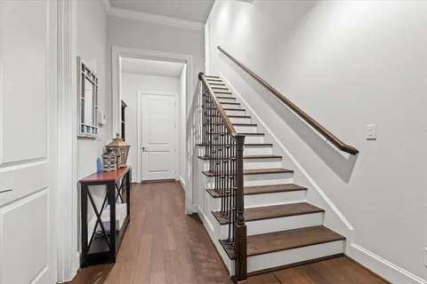 a view of entryway with wooden floor