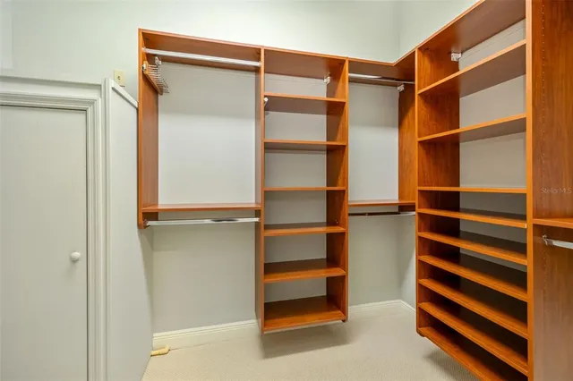 a utility room with sink dryer and washer