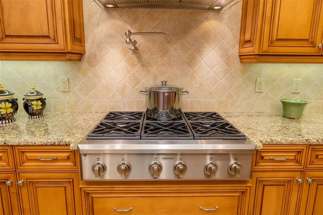 a view of a swimming pool with an outdoor seating